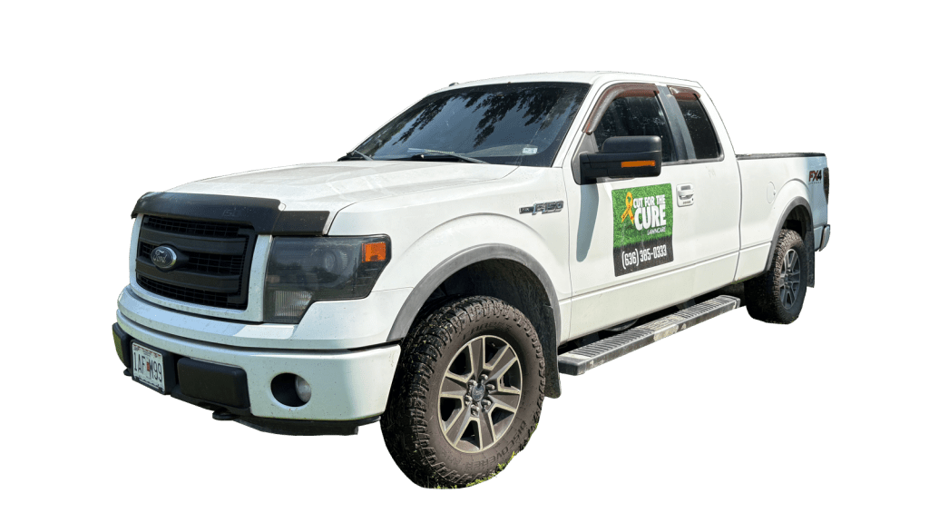 Cut For The Cure Lawncare branded service truck parked in St. Charles County, Missouri